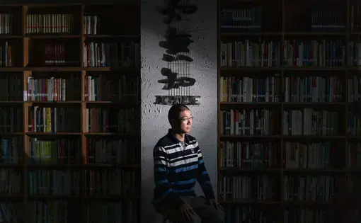 Chen Hongguo in Zhiwuzhi, the reading room he established in Xi'an. Image by Sim Chi Yin. China, 2018.