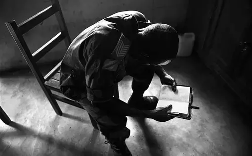 Sergeant 'Boniface' says he was told by his commanding officer to go and rape. He says that he raped three women before his conscience told him to stop. Image by Fiona Lloyd-Davies. DRC, 2013.