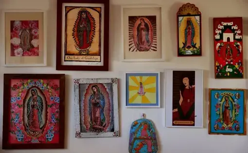 Claudia Castro Luna collects images of the Virgin of Guadalupe, which are displayed in her Seattle home. Her book “Killing Marías” is comprised of 44 poems, each honoring a woman who was killed in Ciudad Juárez. The book was written with the Virgin of Guadalupe in mind. “In order for the book to do what I wanted to do, which was to give dignity, and honor the women … it was important to dwell in the realm of spirit and beauty,” she says. “A constant return to natural spaces of beauty and love.” Image by…