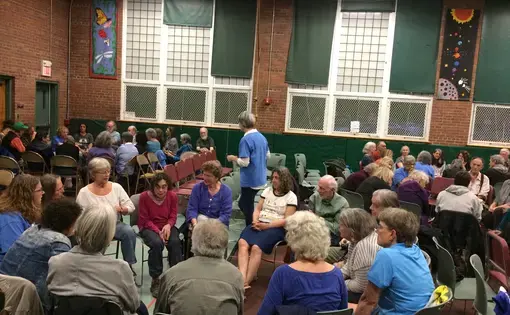 Curious residents and others gather for discussion of a recent Hands Across the Hills Kentucky visit. Image by Richie Davis. United States, 2018.