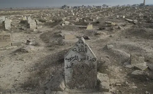 Cemetery destroyed by ISIS in Qayyarah town. Image courtesy of Wikimedia Commons. Iraq, 2016.