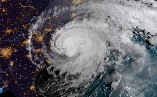 Hurricane Florence makes landfall near Wrightsville Beach at 7:15am September 14, 2018, as a Category 1 storm. The GOES East satellite captured this geocolor image of the massive storm at 7:45am ET, shortly after it moved ashore. Image by NOAA. United States, 2020.