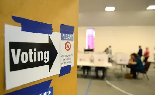Voters come to their polling places to exercise their right to vote in the Presidential elections in Saint Louis, Missouri. Image by Gino Santa Maria / Shutterstock.com. United States, 2016.