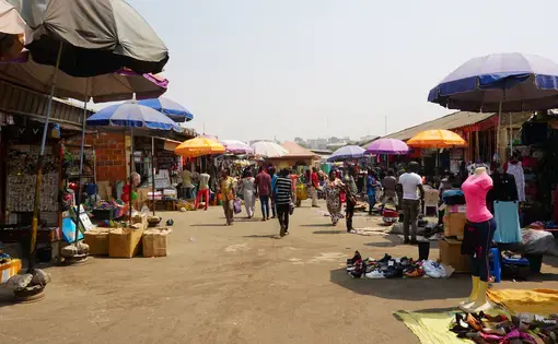 A cross section of Wuse Market in Abuja, Nigeria. Image by Tayvay / Shutterstock. Nigeria, 2018.
