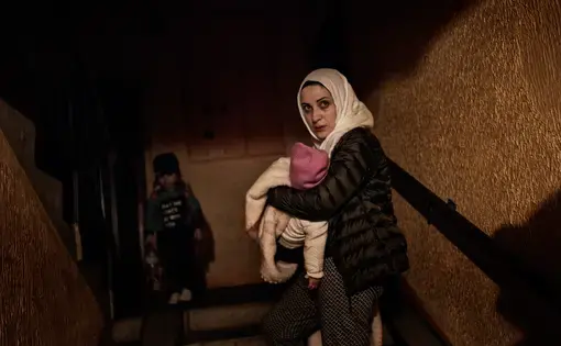 A first glimpse of home. Syrian refugee Taimaa Abazli arrives in Estonia to start the next chapter of her life in Europe. Image by Lynsey Addario. Estonia, 2017.
