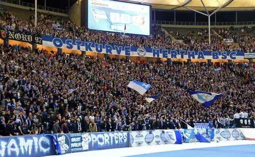 A scene from the past? Hertha BSC Berlin ultras seen during German Bundesliga game against Bayer 04 Leverkusen. Image by Oleksandr Prykhodko / Shutterstock. Germany, 2017.