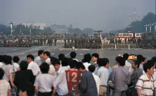 Demonstrators and troops during the Tiananmen Square protests. Image by Kao Bian. Beijing, 1989.