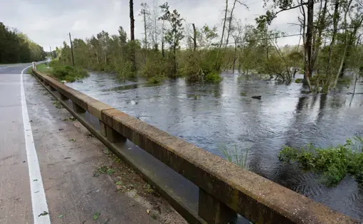 Water from Hurricane Florence rising under a bridge near Fayetteville, North Carolina. Image by Guy J. Sagi / Shutterstock.com. United States, 2018.