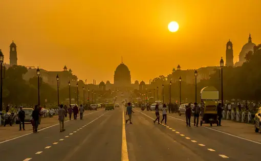 Sunset behind the Rashtrapati Bhavan (Presidential Residence) in New Delhi. Image by Kriangkrai Thitimakorn / Shutterstock. India, undated.