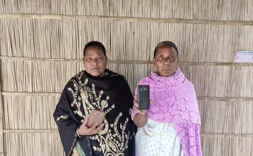 Dinomoni Burman and Swarnobala Roy have successfully ensured they got the documentation for the land ownership done with the help of mobile phone. Image by Gurvinder Singh / VillageSquare. India, undated.