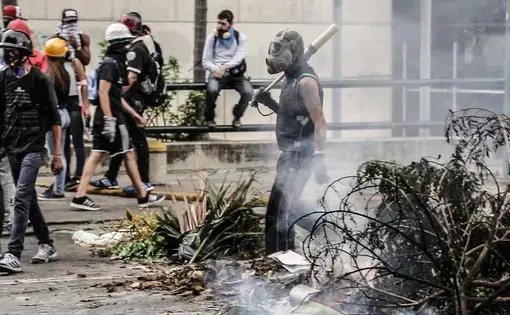 Protestors disperse following an anti-government march in Caracas. Image by Bruno Federico. Venezuela, 2017.