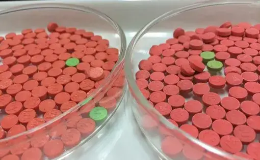 'Ya ba' pills, which are a mixture of methamphetamine and caffeine. Image from Wikimedia Commons (CC BY 2.0).