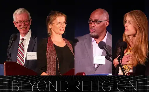 Michael Gilligan, president of the Luce Foundation, and photojournalist Monika Bulaj, investigative reporter Phillip Martin, and freelance journalist Sarah Aziza speak at the National Press Club during Saturday's dinner at the Pulitzer Center's Beyond Religion Conference. Image by Jin Ding. United States, 2019.