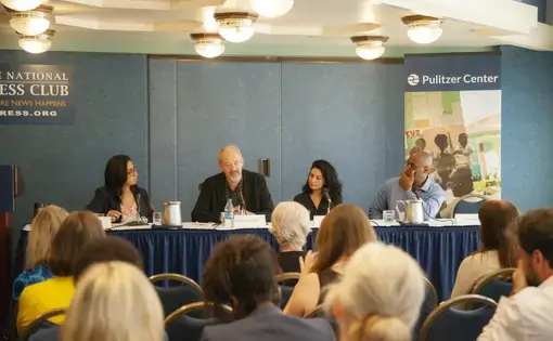 Amber Khan (far left) speaking with Pulitzer Center grantees (from left to right) Callum Macrae, Iris Zaki, and Phillip Martin. Image by Jin Ding. Washington, D.C., 2019.