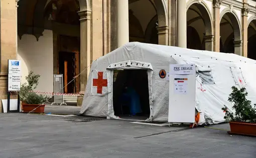 Specially equipped coronavirus station near the hospital in central Florence. Image by Elena.Katkova/Shutterstock. Italy, 2020.