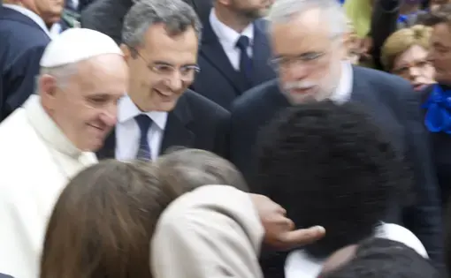 Just one day after announcing that he would no longer use the popemobile, Pope Francis spent about one hour greeting the crowds at his papal Audience on June 15, 2014. Image by Molly K. Dutmers. Italy, 2014. Media file: pope.jpg