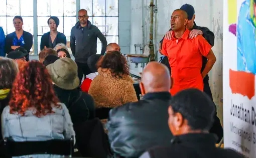 Victor Santiago (played by Carlos Aguirre) being led back to his prison cell by Officer Jones (played by actor Lawrence Radecker) after a visit with his daughter. United States, 2019.