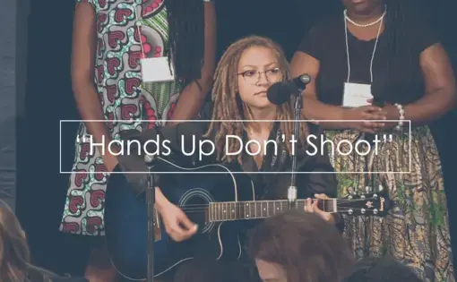 Indigo Passariello, a sophomore from Howard University, performed her song at the Beyond War conference dinner. Image by the National Press Club. Washington, D.C., 2018.