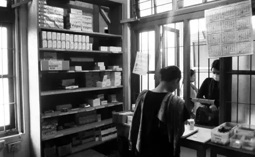 Pictured here is the pharmacy at the Doctors without Borders site in Churachandpur Manipur, where Valganciclovir, otherwise commonly known as Valgan, the medication to treat CMV retinitis (a virus which causes blindness in HIV patients), is accessible for patients, but still remains out of reach for many in India. Image by Aditi Kantipuly. India, 2016. Doctors without Borders site in Churachandpur