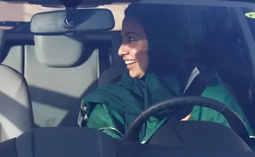A Saudi woman sits in a car during driver's training at a university in Jeddah. Image by Faisal Al Nasser. Saudi Arabia, 2018.