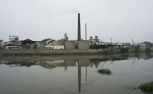 The government has been reluctant to acknowledge the scale of the problem in Zhoutie, where soil has been contaminated with heavy metals discharged by chemical plants like this one. Image by Wu Di. China, 2014. Media file: china_5.jpg