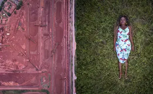 Aerial view of the "Mineradora Rio Norte" on the river Trombetas, and Drica lying on her territory. Image by Pablo Albarenga. Brazil, 2019.