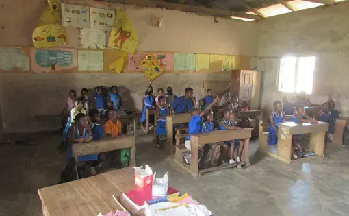 Atsu and Divine at their school. Image courtesy of Eric Peasah. Ghana, undated.