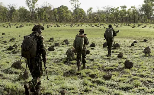 Rangers employed by the Chinko Project, in eastern Central African Republic, set out on a morning patrol to look for poachers and armed cattle herders. Image by Elliott Woods. Central African Republic, 2016. Rangers employed by the Chinko Project, in eastern Central African Republic, set out on a morning patrol to look for poachers and armed cattle herders.