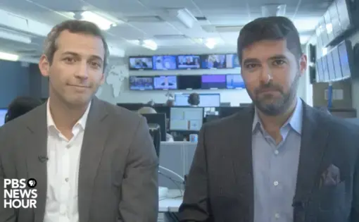 Nick Schifrin and P.J. Tobia discuss the new PBS NewsHour series "Inside Putin's Russia."  Image from PBS NewsHour Facebook Live video. United States, 2017.