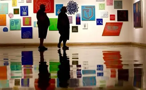 William New, left, and Elizabeth Carpenter, both of Beloit, Wisconsin, during a visit to the Rockford Art Museum of Tuesday. Image by Susan Moran/Rockford Register Star. United States, 2020.