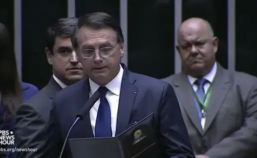 Brazilian President Jair Bolsonaro. Image by PBS NewsHour. Brazil, 2019. Brazilian President Jair Bolsonaro. Image by PBS NewsHour. Brazil, 2019.