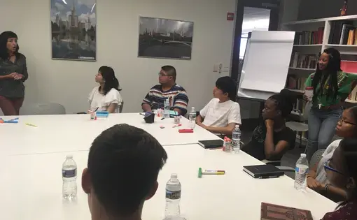 Pulitzer grantee and photojournalist Allison Shelley discusses her photo-taking process with students participating in the Tomodachi Youth Exchange. Image by Lauren Ison. Washington, D.C., 2017.