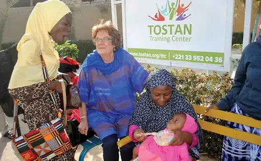 Molly Melching has grown Tostan into an organization that focuses on literacy, health, hygiene, community governance, and more. Image by Amy Yee. Senegal, 2017.