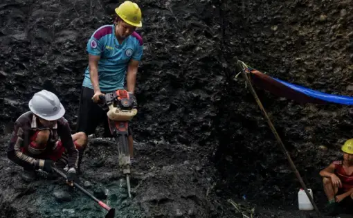 Freelance miners use jackhammers to search for jade in a Myanmar mine. Image by Hkun Lat. Myanmar, 2020.
