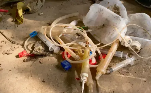 Medical waste found in the Cisadane River in Tangerang, Indonesia. Image by Adi Renaldi. Indonesia, undated.