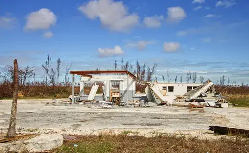 Freeport, Grand Bahama Island, Bahamas - October 11 2019 : Eastern part of the Grand Bahama Island where most of the devastation occurred from Hurricane Dorian. View of destroyed gas station. Image by Anya Douglas / Shutterstock. Bahamas, 2019.