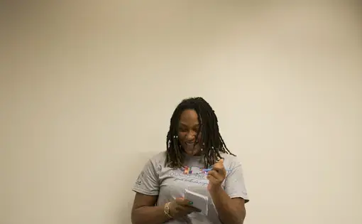 A Soul of the City student records video during Pulitzer Center grantee Roger Thurow's presentation. Image by Jordan Roth. United States, 2016.