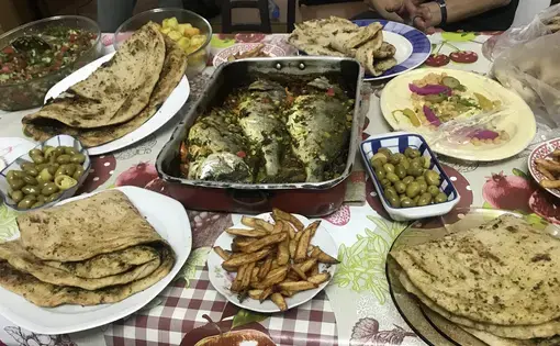 The lunch prepared by Doha upon learning of the reporter's visit to her farm. Image by Carly Graf. West Bank, 2019.
