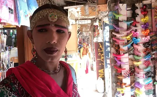 Sohni, originally from Punjab, was born intersex. She was given away by her mother to live with other intersex individuals at the age of 7. She now begs for money at Meena Bazaar in Karachi. Image by Rubab Anwar. Pakistan, 2017.