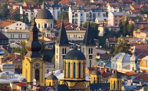 project page image Media file: sarajevo-rooftops-with-catholic-and-orthodox-cathedrals_charles-bowman_getty_cs.jpg