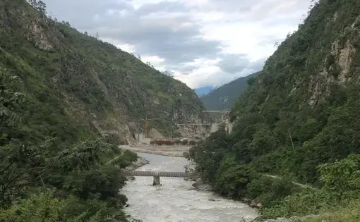 The Punatsangchhu River is the hotspot for hydropower construction in Bhutan: Pictured is the new mega Punatsangchhu-II hydroelectric project, delayed extensively by geologic challenges. Image by Emma Johnson. Bhutan, 2019. The Punatsangchhu River is the hotspot for hydropower construction in Bhutan: Pictured is the new mega Punatsangchhu-II hydroelectric project, delayed extensively by geologic challenges. Image by Emma Johnson. Bhutan, 2019.