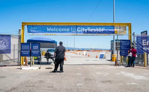 A COVID-19 testing center in San Francisco, California. Image by Hunter Crenian / Shutterstock. United States, 2020.