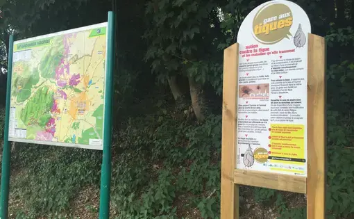 As part of France's national plan against Lyme, 2,000 "Beware of Ticks" signs will be placed at forest entrances. This one stands across from some vineyards in the northeastern town of Kintzheim. Image by David Scales. France, 2017. As part of France's national plan against Lyme, 2,000 "Beware of Ticks" signs will be placed at forest entrances. This one stands across from some vineyards in the northeastern town of Kintzheim. Image by David Scales. France, 2017.