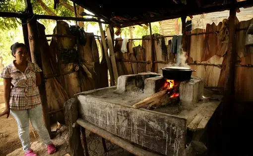 Beans cooking over wood fire