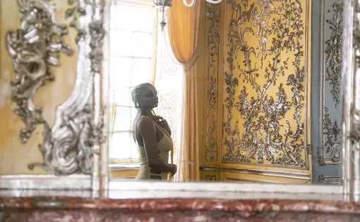 Favour, a 16-year-old refugee, poses for a portrait at the Amalienburg Castle in Bavaria. Image by Angelica Ekeke. Germany, 2019.
