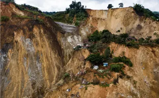 A landscape view shows a recent landslide at Gwi Hka jade mining site in Hpakant, Kachin state, Myanmar, on July 16. Image by Hkun Lat. Myanmar, 2020.