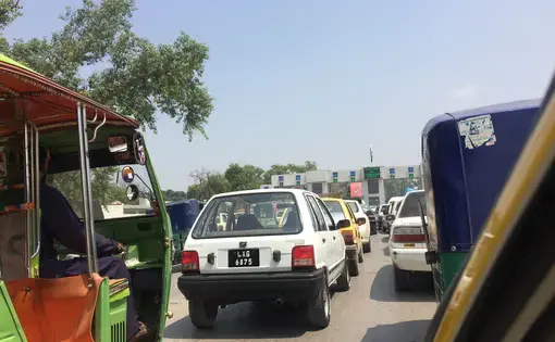Traffic backs up at what will probably become a permanent checkpoint in Peshawar.  Image by Umar Farooq. Pakistan, 2017.