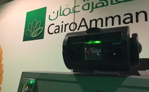 Iris-scanners like this one, attached to ATM machines at branches of Cairo Amman Bank across Jordan, allow registered refugees to access their UNHCR cash assistance and money for food assistance, issues by the World Food Program. Refugees have their iris scanned when they first register with UNHCR. This data is cross-referenced when they access their benefits through the ATMs. Image by Rachel Townzen. Jordan, 2016.