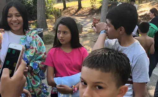 A California summer camp helps families stay close while a parent is in prison. Image by Jaime Joyce for TIME Edge. California, 2018.