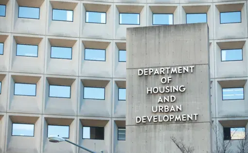 Sign in front of the Department of Housing and Urban Development in downtown Washington, D.C. Image by Mark Van Scyoc / Shutterstock. United States, 2014.